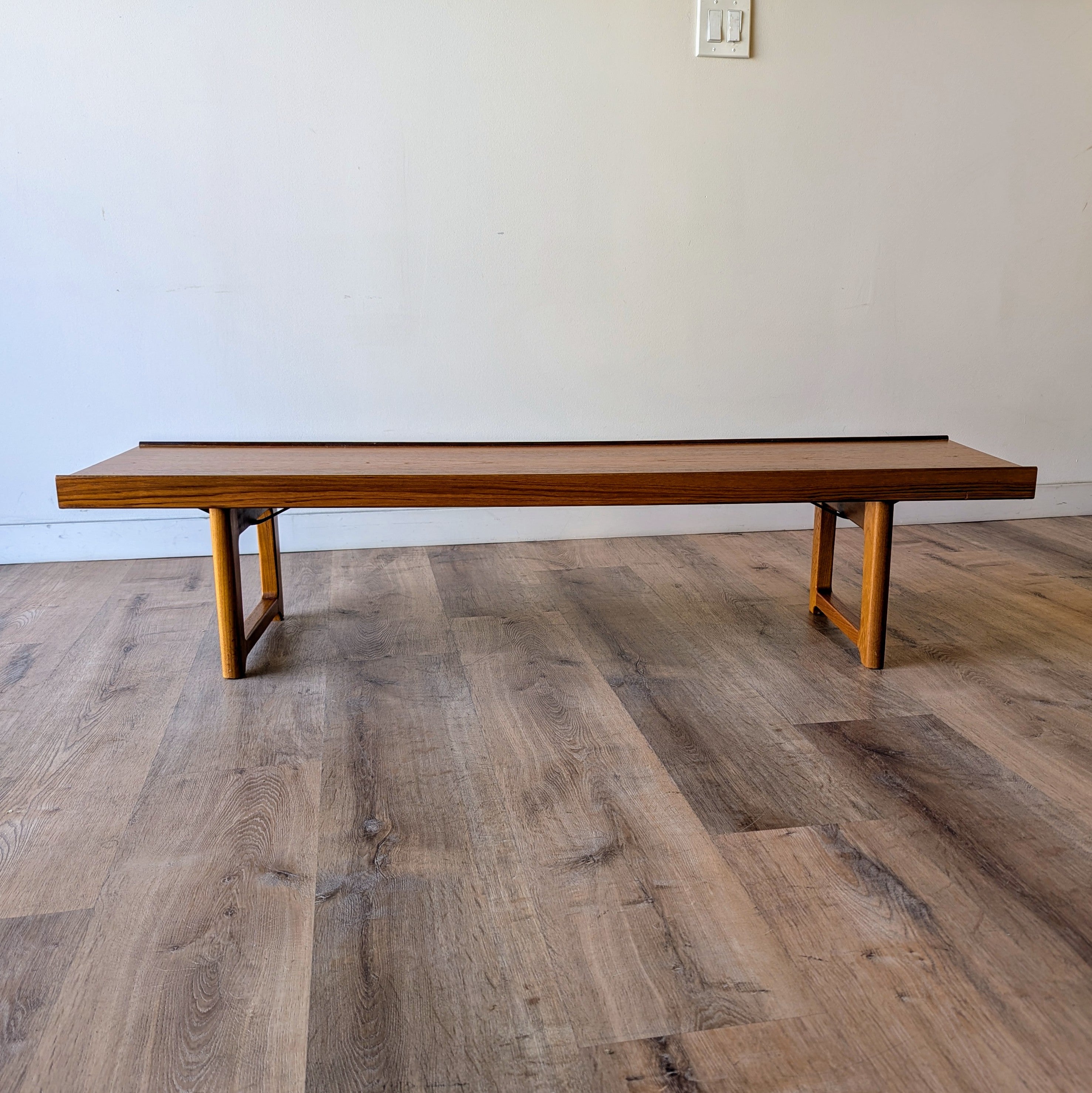 A teak Norwegian Modern 'Krobo' bench designed by Torbjørn Afdal at Sparklebarn in Seattle.