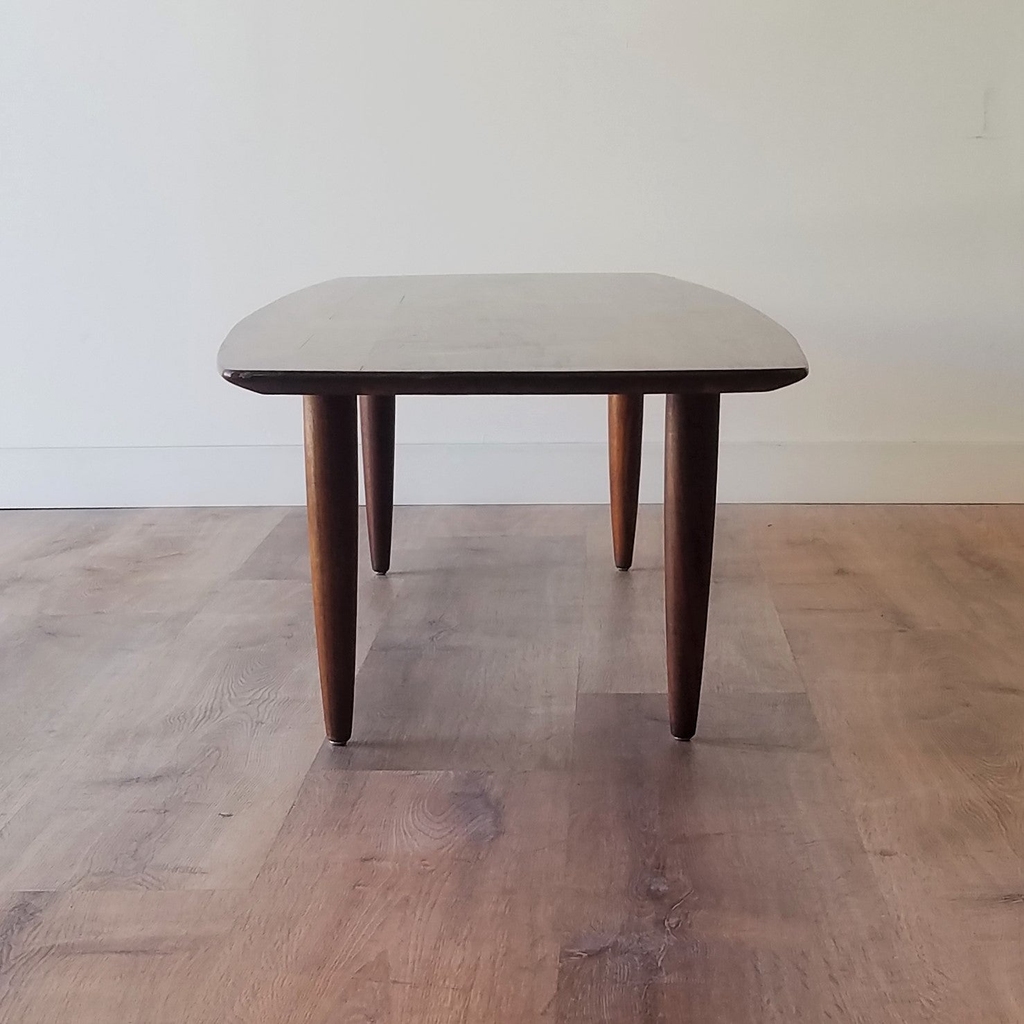 Angled Front view of American Mid-Century Modern Prelude Walnut Surfboard Coffee Table in Ballard, Seattle.