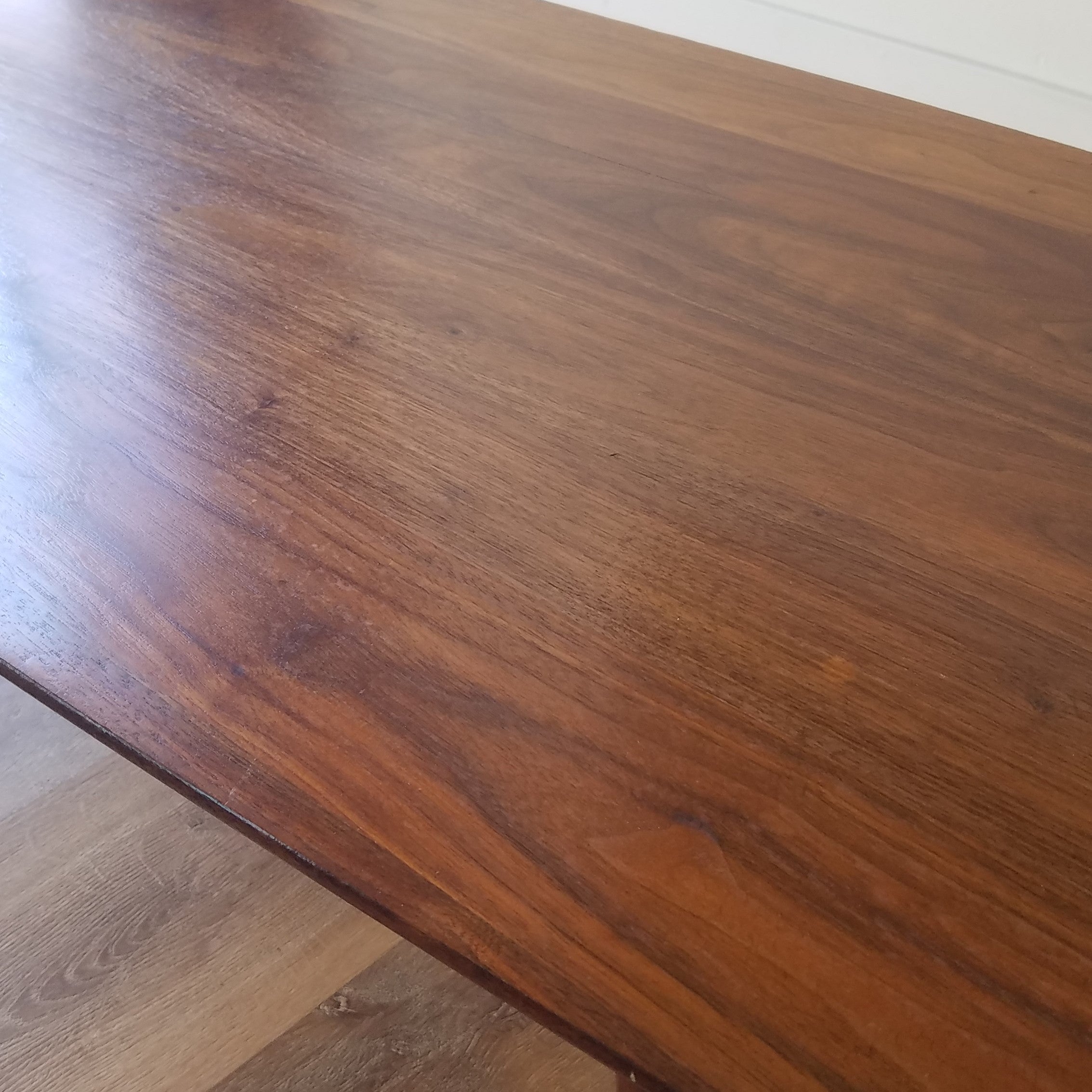 Detail view of 1960s American Mid-Century Modern Prelude Walnut Surfboard Coffee Table in Seattle, Washington.