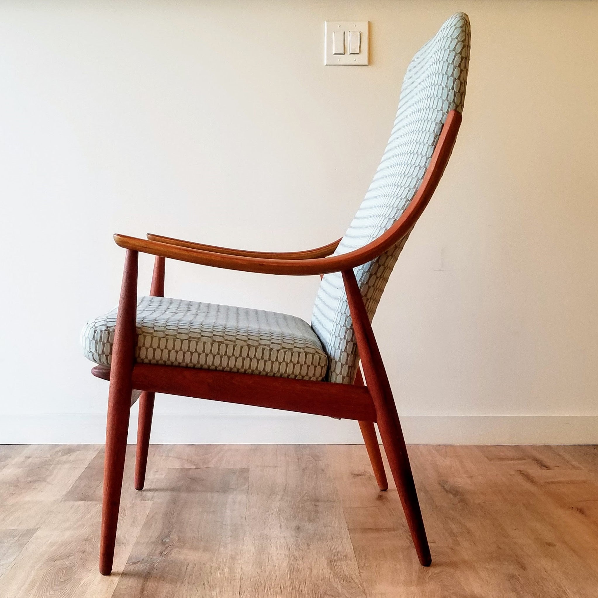 Side View of a Mid-Century Lounge Chair designed by Peter Hvidt & Orla Molgaard-Nielsen for France and Son. See this chair and other newly upholstered vintage furniture at SPARKLEBARN in Seattle,WA.