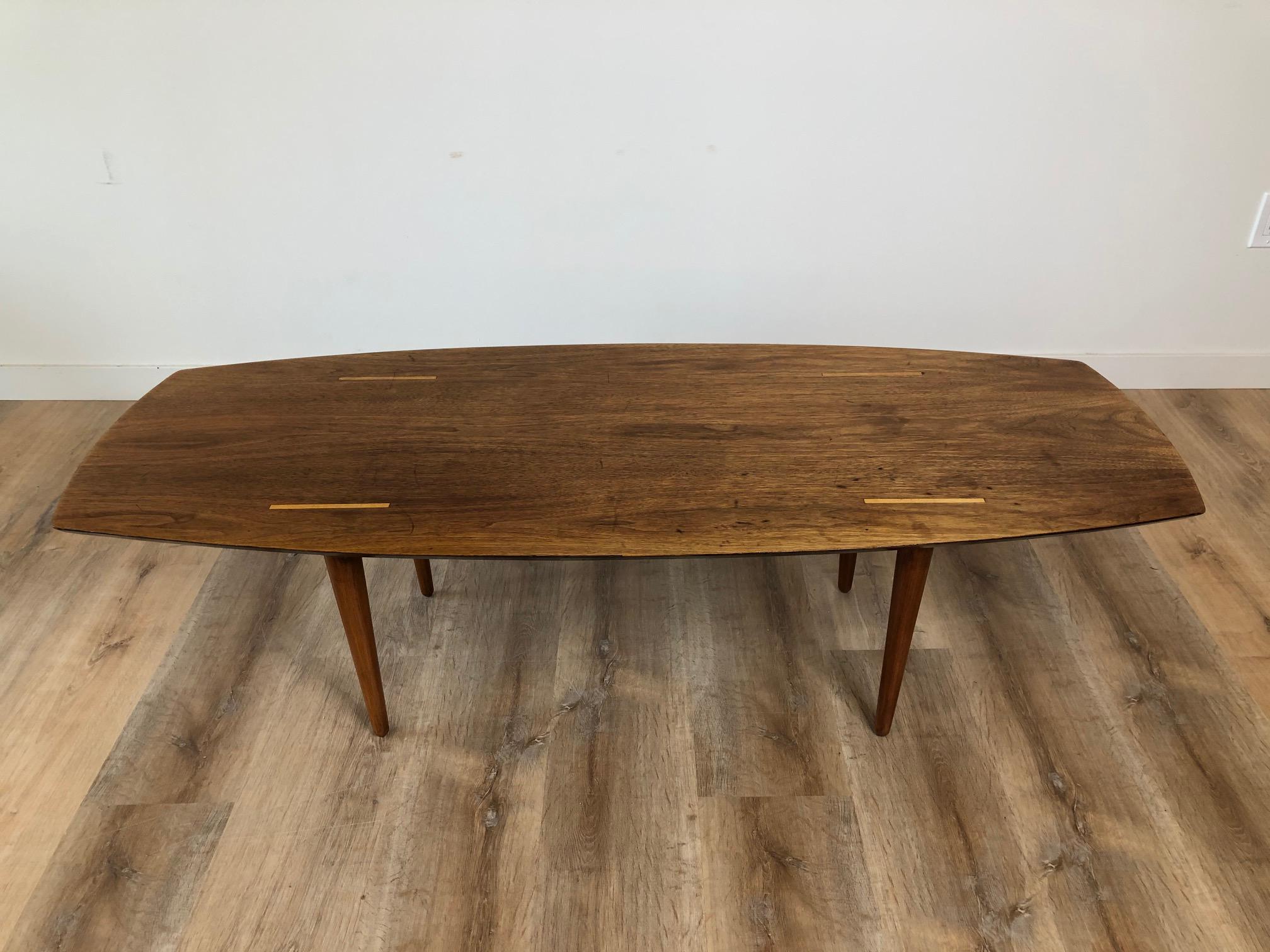 Side View of a restored Mid-Century Modern surfboard coffee table designed by Abel Sorensen for Knoll. Find this at SPARKLEBARN in Seattle, WA next to the Nordic Museum in Ballard.