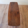 Angled Top view of American Mid-Century Modern Prelude Walnut Surfboard Coffee Table in Seattle, Washington.