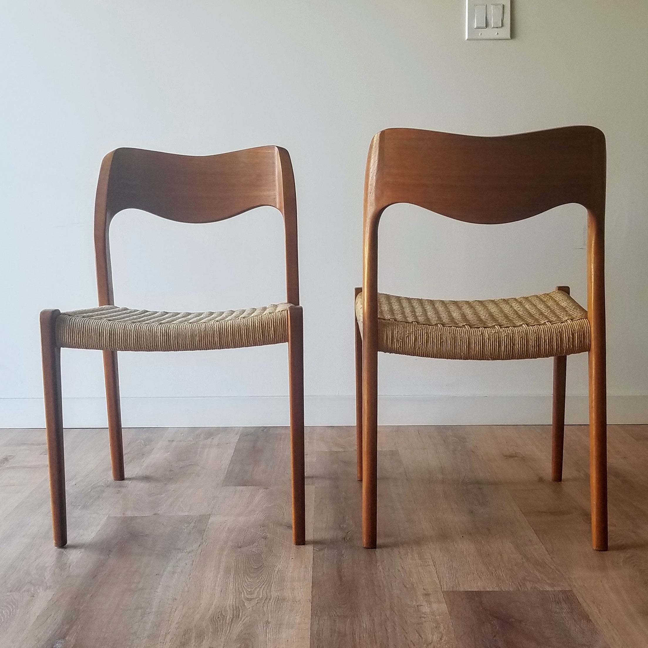 Front and back view of a Mid-Century Modern Dining Chairs (Model 71) designed by Niels Moller. Find this and other Scandinavian furniture at SPARKLEBARN in Ballard.