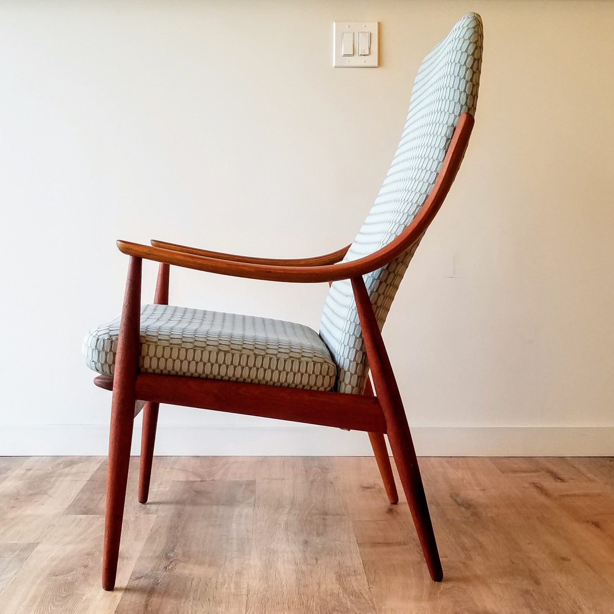 Side View of a Mid-Century Lounge Chair designed by  Peter Hvidt & Orla Molgaard-Nielsen for France and Son. See this chair and other newly upholstered vintage furniture at SPARKLEBARN in Seattle,WA.