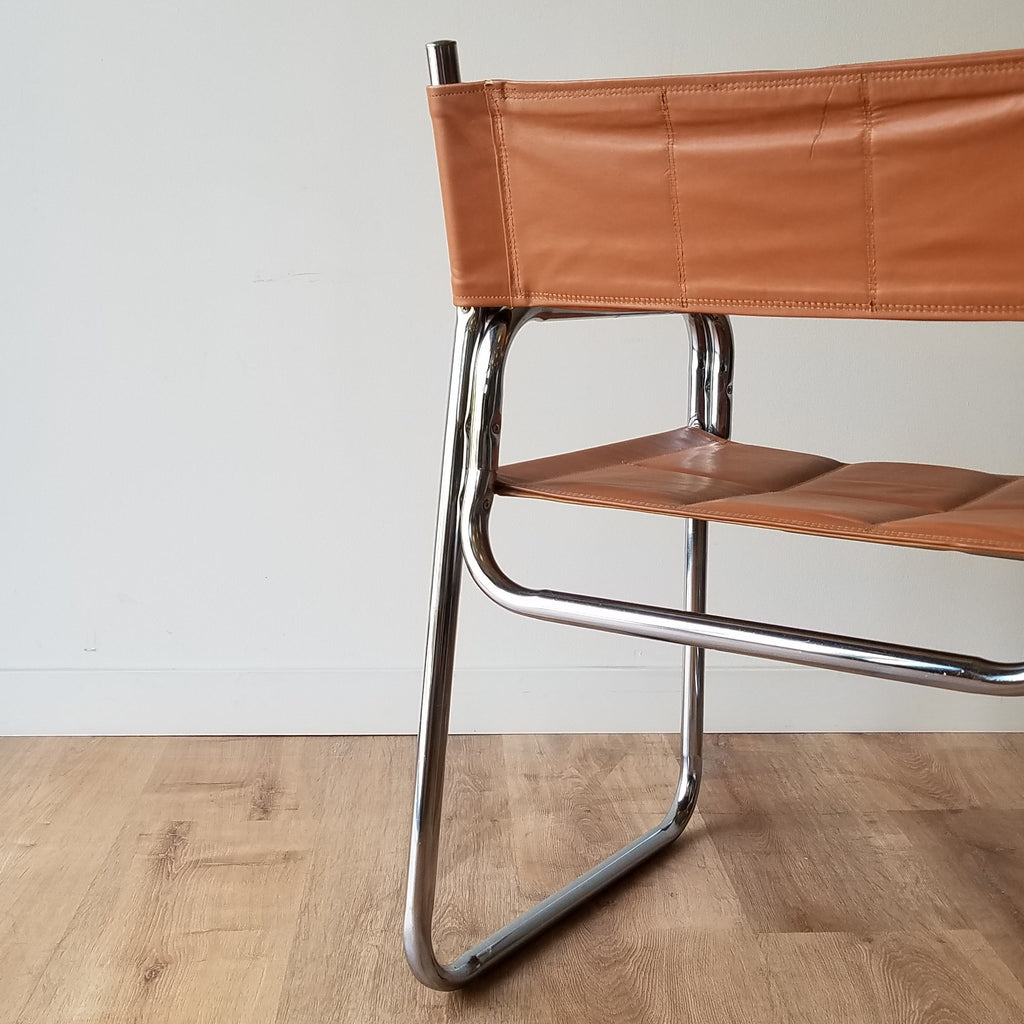 Detail View of a Vintage Chrome Dining Chairs with Brown Vinyl Seat and Backrests. Find them at SPARKLEBARN in Seattle, WA.