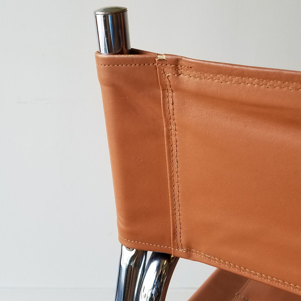 Detail View of a MCM Chrome Dining Chair with Brown Vinyl Seat and Backrests. Find them at SPARKLEBARN in King County.