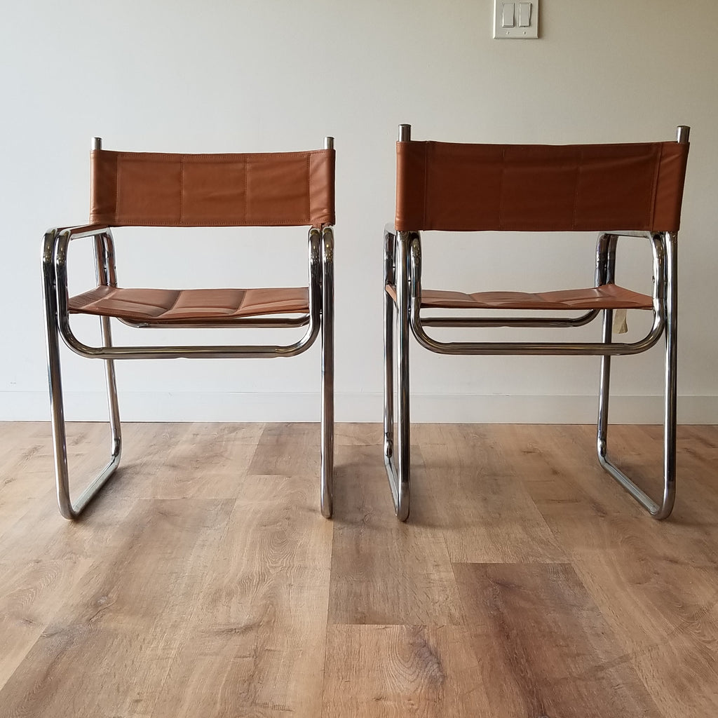 Front and Back View of a Pair of Vintage Chrome Dining Chairs with Brown Vinyl Seat and Backrests. Find them at SPARKLEBARN in Washington State.