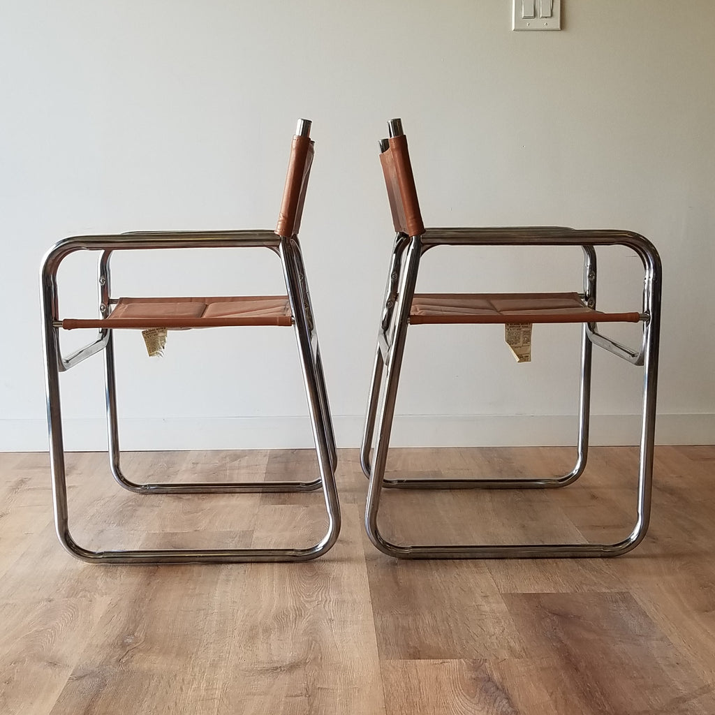 Side View of a pair of Mid-Century Modern Chrome Dining Chairs with Brown Vinyl Seat and Backrests. Find them at SPARKLEBARN in Seattle..