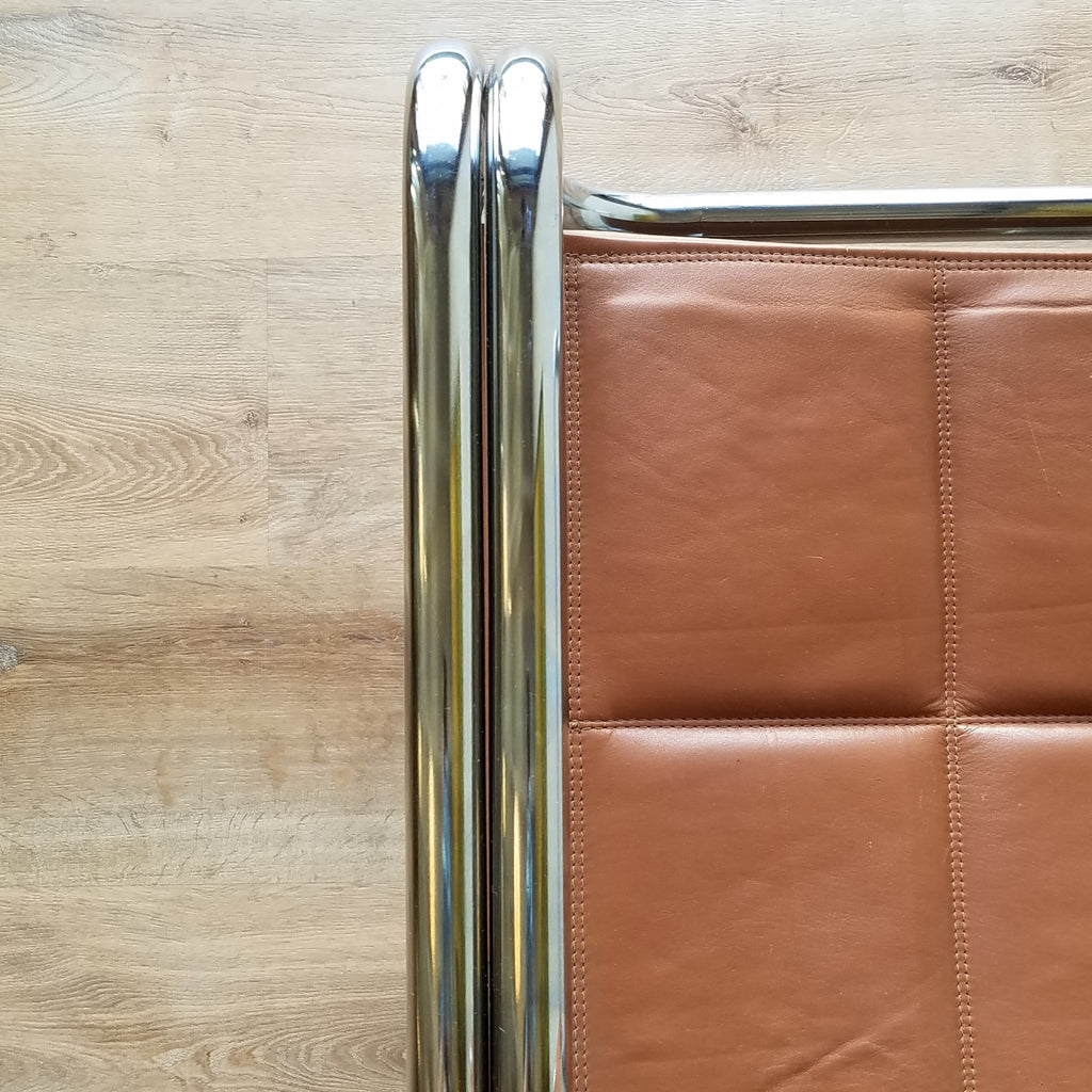 Detail View of a Retro Chrome Dining Chair with Brown Vinyl Seat and Backrests. Find them at SPARKLEBARN in Seattle.