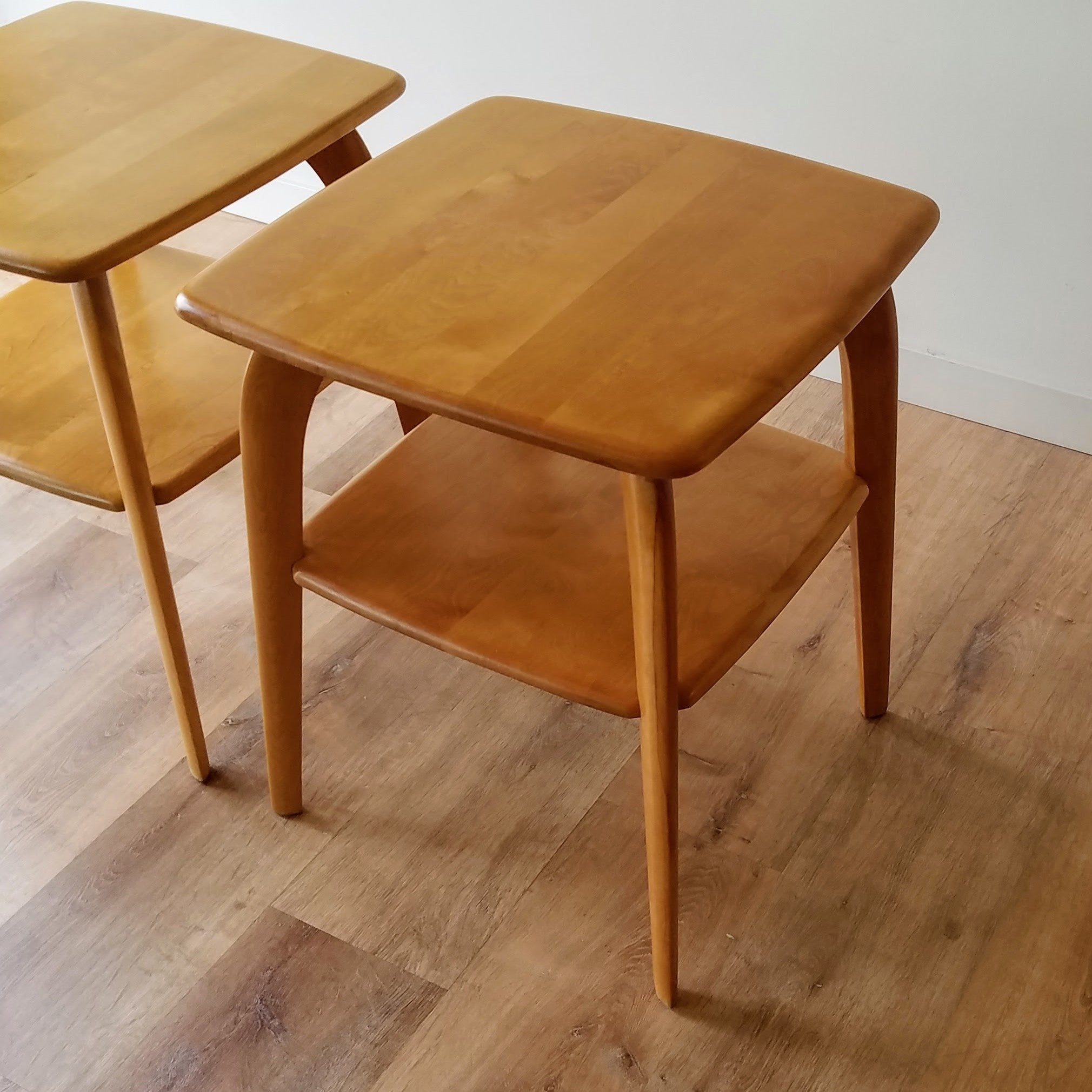 Quarter angle view of 1950s vintage birch lamp tables made by Heywood Wakefield, can be found at SPARKLEBARN, a fine furniture and furnishings store in Seattle,WA.