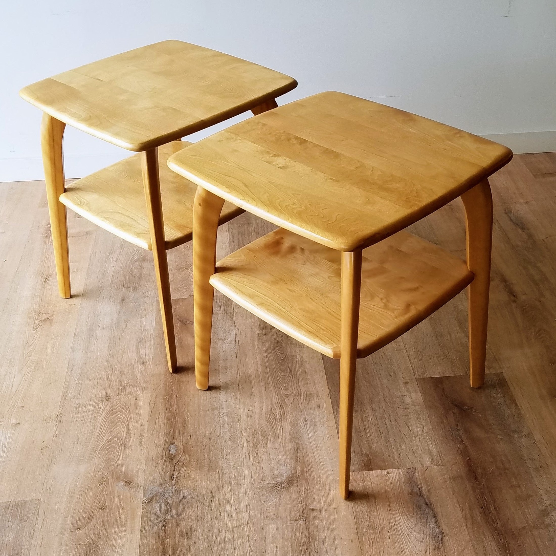 Quarter angle view of 1950s vintage birch lamp tables made by Heywood Wakefield, can be found at SPARKLEBARN, a fine furniture and furnishings store in Seattle,WA.